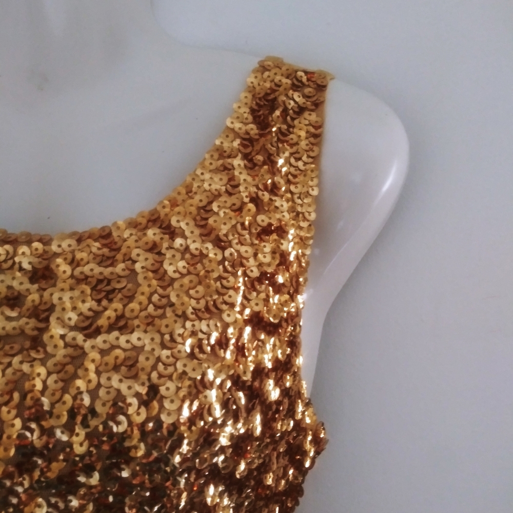Whitewed gold sequin tank top.